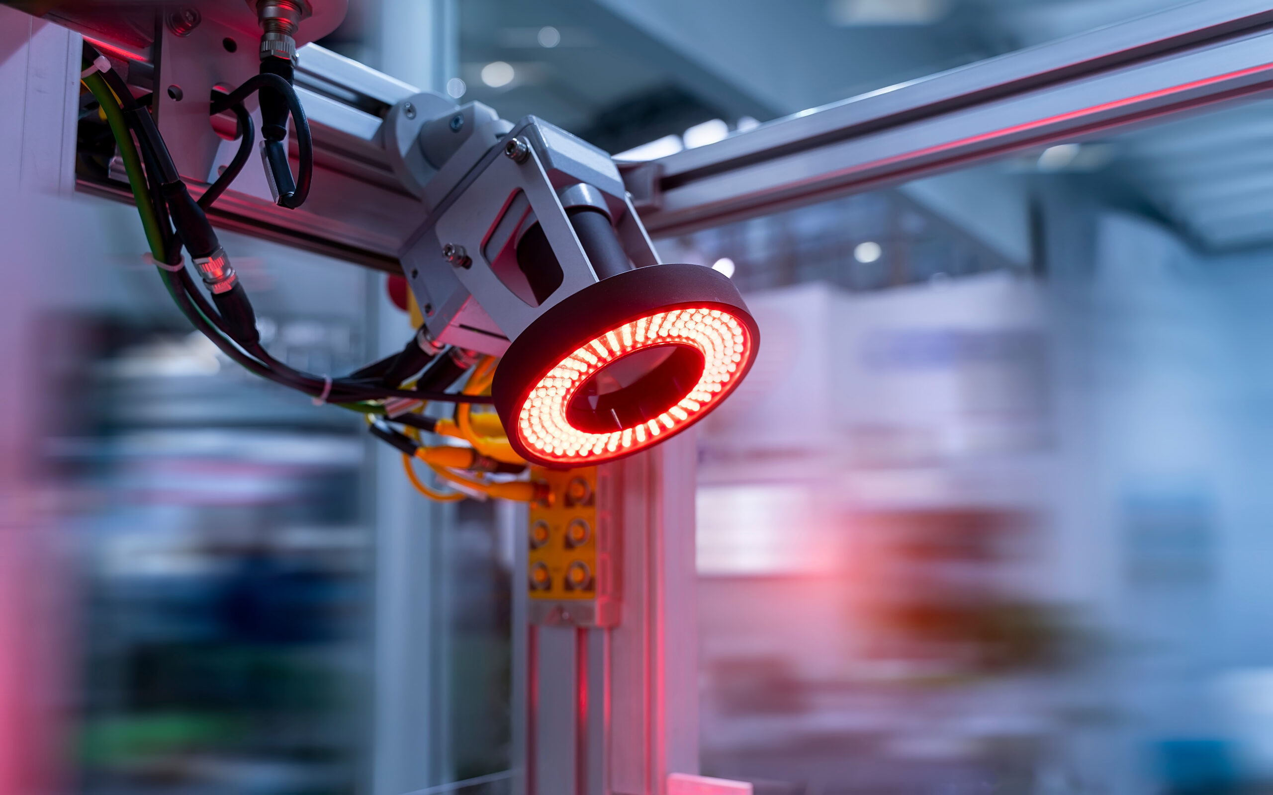 Machine vision camera system with illuminated optical sensor used in industrial automation.
